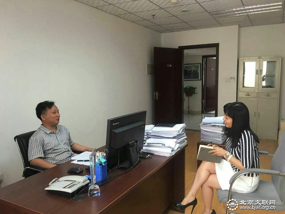 09作家刘晓晖采访规划发展部副部长周浩